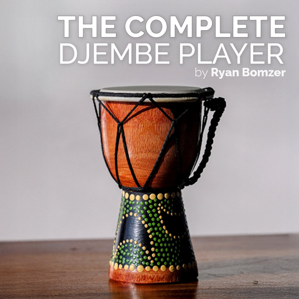 Djembe drum on a wooden surface with 'The Complete Djembe Player' text above.