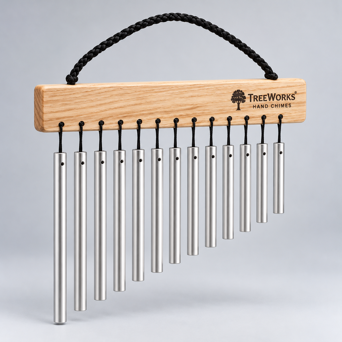 TreeWorks handheld chime on light silver-grey background; pending visual verification
